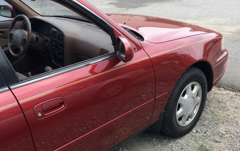 Add photo: after repair, door panel repainted